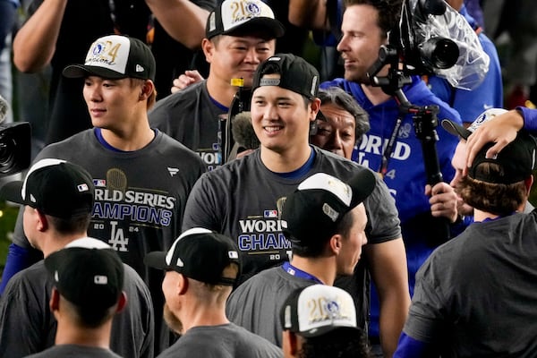 Los Angeles Dodgers' Shohei Ohtani celebrates their win against the New York Yankees in Game 5 to win the baseball World Series, Thursday, Oct. 31, 2024, in New York. (AP Photo/Frank Franklin II)