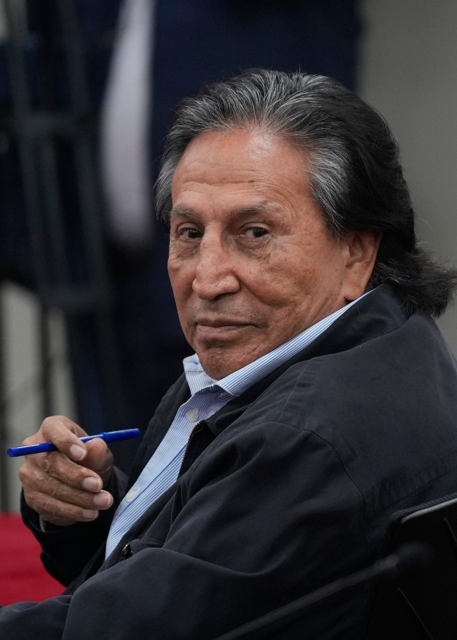 Former Peruvian President Alejandro Toledo attends a court session where the judge will rule in his corruption case in Lima, Peru, Monday, Oct. 21, 2024. (AP Photo/Guadalupe Pardo)