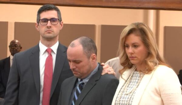 Ryan Dukes (center) reacts as the verdict is read in Ocilla County.