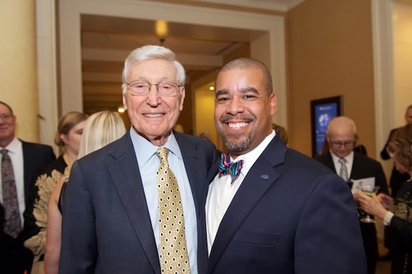 Bernie Marcus, left, hired Joe Handy, right, as part of the founding team for the Georgia Aquarium. Handy would go on to serve as its president and COO.