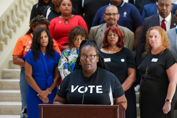 Brittany Burns of Protect the Vote GA spoke in opposition to new rules approved by the State Election Board that will take effect before the Nov. 5 presidential election.  “I can also just see us literally impacting the entire nation with this,” Burns said during a Capitol press conference. “This can actually impact the presidential election.” (Jason Getz / AJC)
