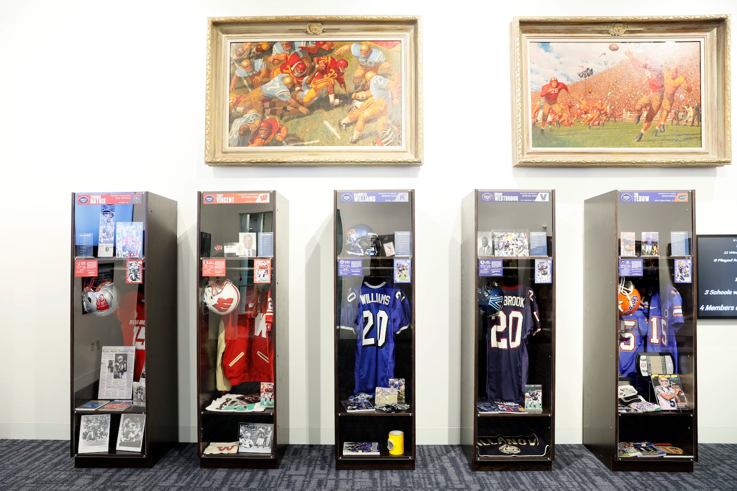 The College Football Hall of Fame presented a temporary locker exhibit that pays tribute to the 22 individuals inducted into the 2023 Hall of Fame class. Miguel Martinez /miguel.martinezjimenez@ajc.com