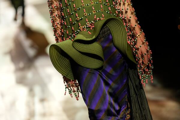 A model wears a creation as part of the Dries Van Noten Fall/Winter 2025-2026 Womenswear collection presented in Paris, Wednesday, March 5, 2025. (Photo by Scott A Garfitt/Invision/AP)