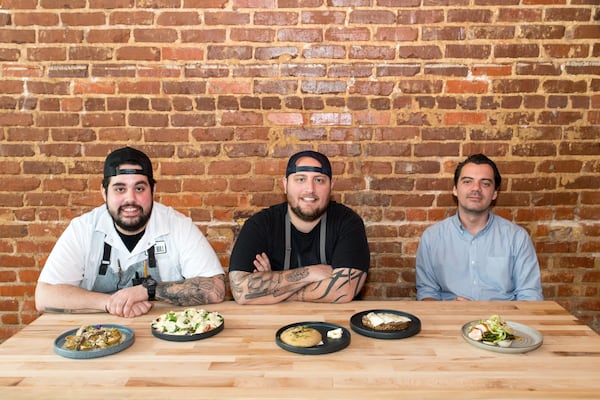  The White Bull owners: (from left to right) sous chef Pat Siciliano, executive chef Pat Pascarella, and general manager Gabriele Besozzi. Photo credit- Mia Yakel.