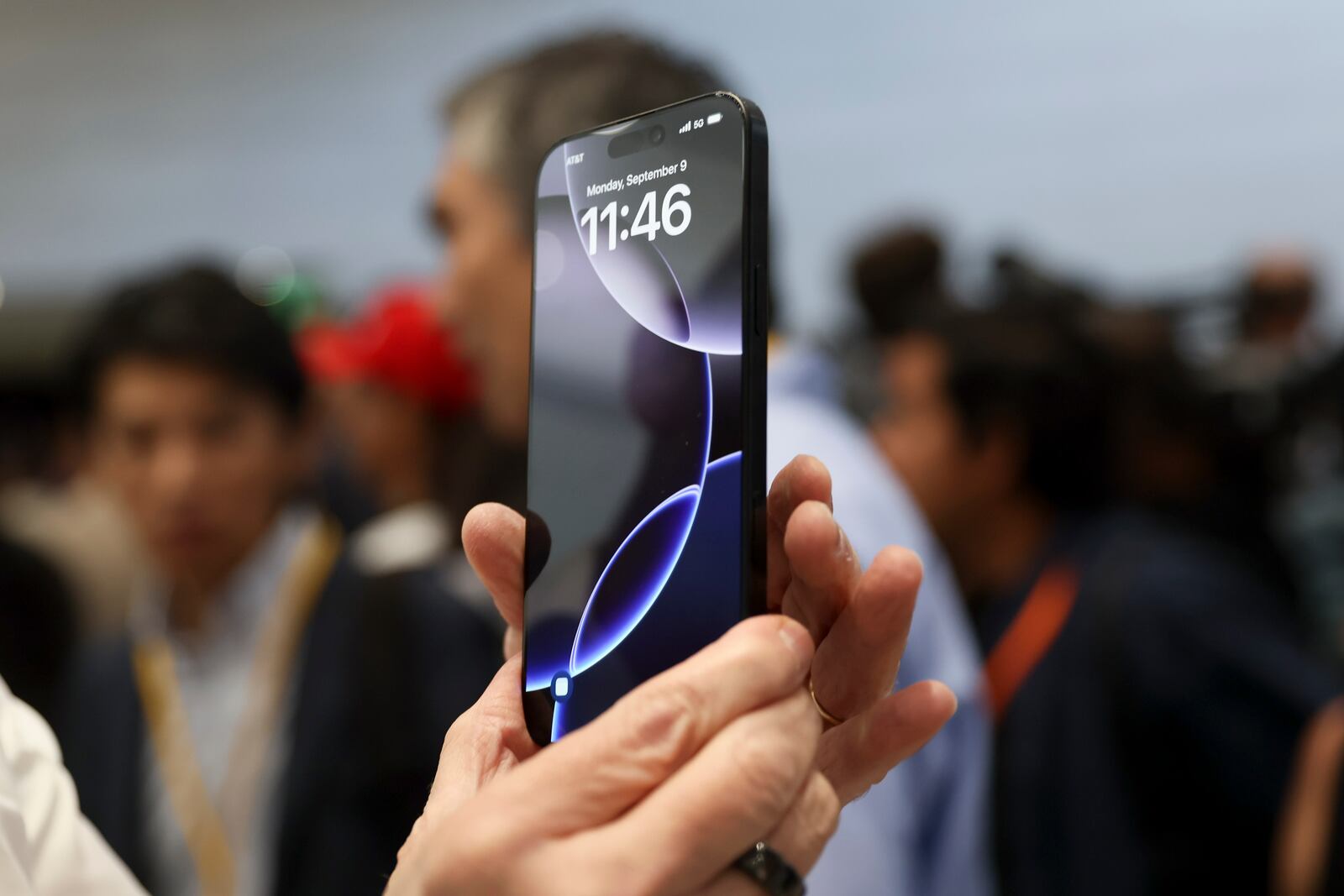 The new iPhone 16 is displayed during an announcement of new products at Apple headquarters Monday, Sept. 9, 2024, in Cupertino, Calif. (AP Photo/Juliana Yamada)