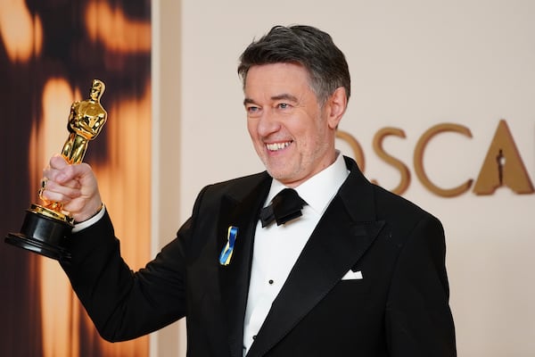 Peter Straughan, winner of the award for best adapted screenplay for "Conclave," poses in the press room at the Oscars on Sunday, March 2, 2025, at the Dolby Theatre in Los Angeles. (Photo by Jordan Strauss/Invision/AP)