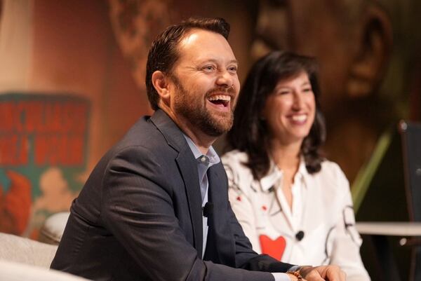 Carter Center board chairman Jason Carter and Carter Center CEO Paige Alexander share a laugh at an opening day event at the organization's 31st annual weekend retreat. The event is being held in Atlanta for the first time.