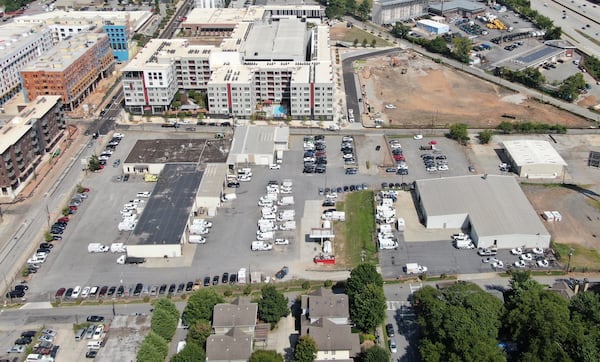 Aerial photography shows Grady EMS (left) and Reliant Emergency Services (right) in Atlanta. In recent years, Grady has become the largest ambulance provider in the state, amid an aggressive campaign to win up dozens of contracts with counties in Georgia. Critics say its new role collides with its mission to serve Atlanta’s poor. (Hyosub Shin / Hyosub.Shin@ajc.com)