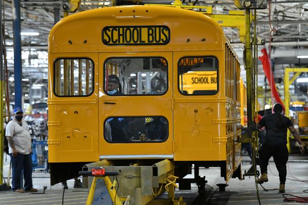 An $80 million federal grant to iconic bus-maker Blue Bird -- an amount that the company is matching -- will mean construction of a 600,000 square-foot factory making electric buses and 400 new assembly line jobs in Ft. Valley.  (Hyosub Shin / Hyosub.Shin@ajc.com) (Hyosub Shin / Hyosub.Shin@ajc.com)