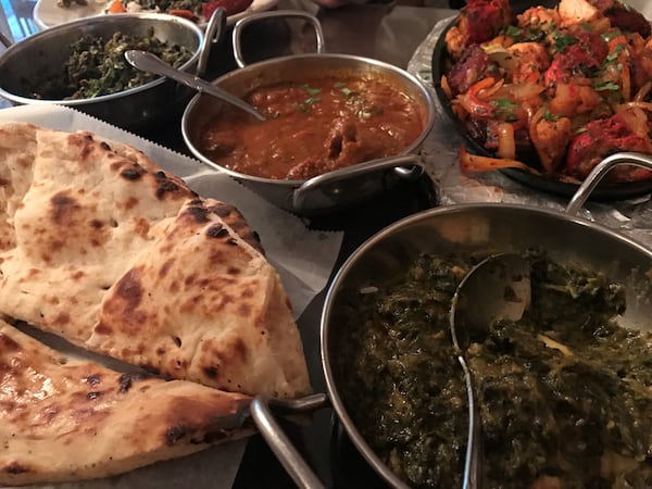  Palak paneer (bottom right) from Moon Indian Cuisine / Photo by Ligaya Figueras