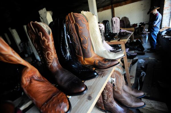 A man wearing just cowboy boots and his underwear was arrested Saturday night at a Walmart in Tennessee.