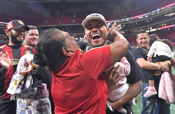 December 8, 2018 Atlanta - Atlanta United forward Josef Martinez celebrates with his family after the team won MLS championship over the Portland Timbers on Saturday, December 8, 2018. HYOSUB SHIN / HSHIN@AJC.COM