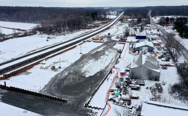 An aerial photo shows where crews are backfilling stone and gravel on the site of the Feb. 3, 2023, Norfolk Southern freight train derailment, Monday, Jan. 22, 2024, in East Palestine. (Matt Freed for the Atlanta Journal Constitution)