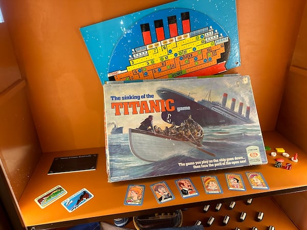 A vintage Titanic board game is displayed at "Titanic: An Immersive Voyage" at Exhibition Hub in Doraville. RODNEY HO/rho@ajc.com