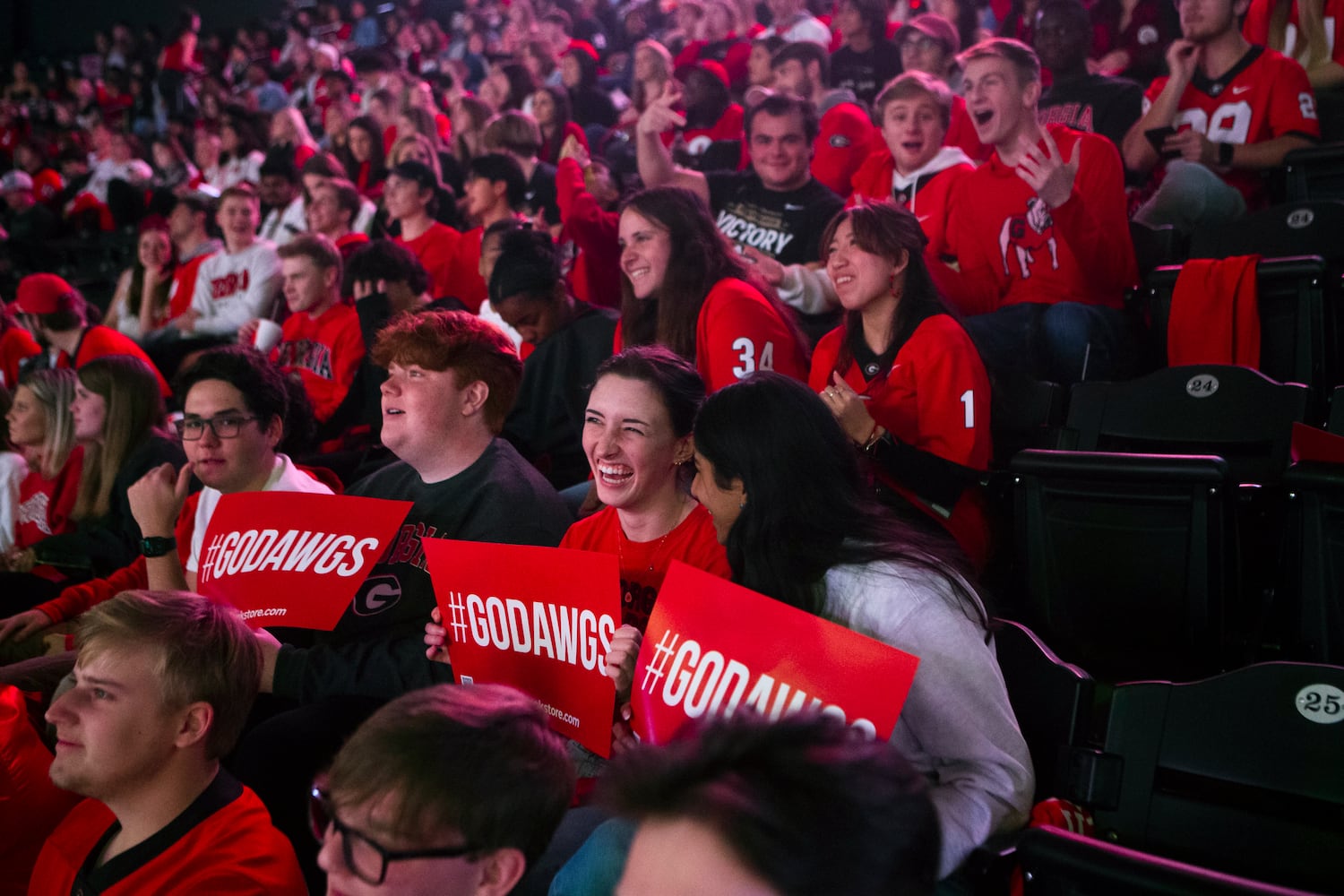 University of Georgia fans watch the College Football Championship on Monday, January 9, 2023, at Stegeman Coliseum in Athens, Georgia. The University of Georgia defeated the Texas Christian University football team 65-7. CHRISTINA MATACOTTA FOR THE ATLANTA JOURNAL-CONSTITUTION.