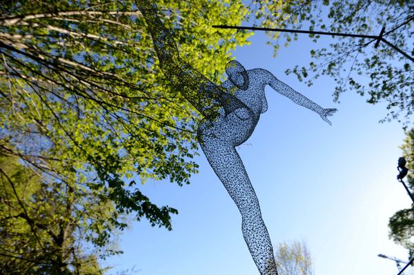 Art lovers have long flocked to the Atlanta Dogwood Festival looking for pieces, like this sculpture, to add to their collections.