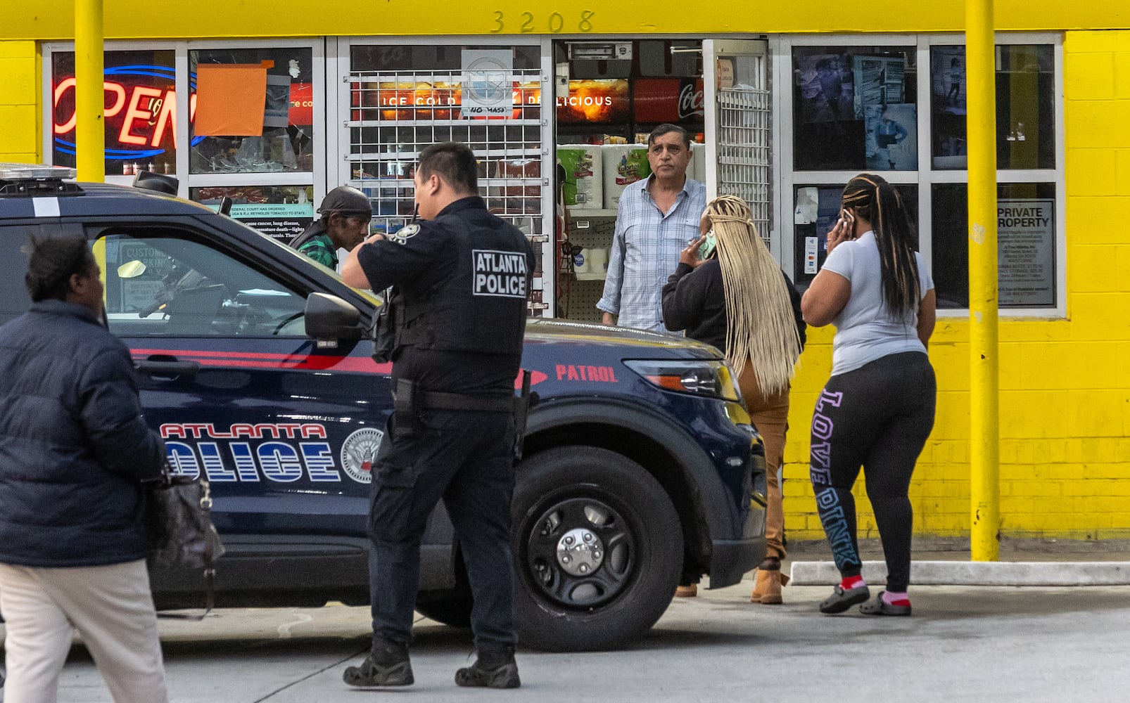 A security guard and his suspected assailant were both shot during the struggle over a gun at the Discount Food Mart on Martin Luther King Jr. Drive in southwest Atlanta the morning of March 15, 2024. 