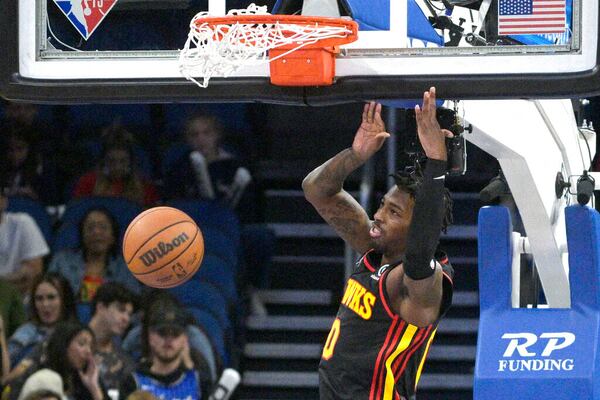 Hawks guard Delon Wright dunks during the second half against the Orlando Magic on Wednesday night in Orlando, Florida. (AP Photo/Phelan M. Ebenhack)