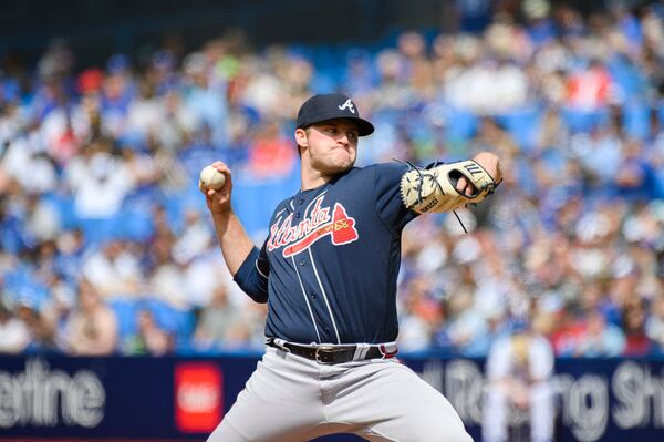 Atlanta Braves starting pitcher Bryce Elder (55) throws during the first inning of a baseball against the Toronto Blue Jays, Saturday, May 13, 2023, in Toronto. (Christopher Katsarov/The Canadian Press via AP)