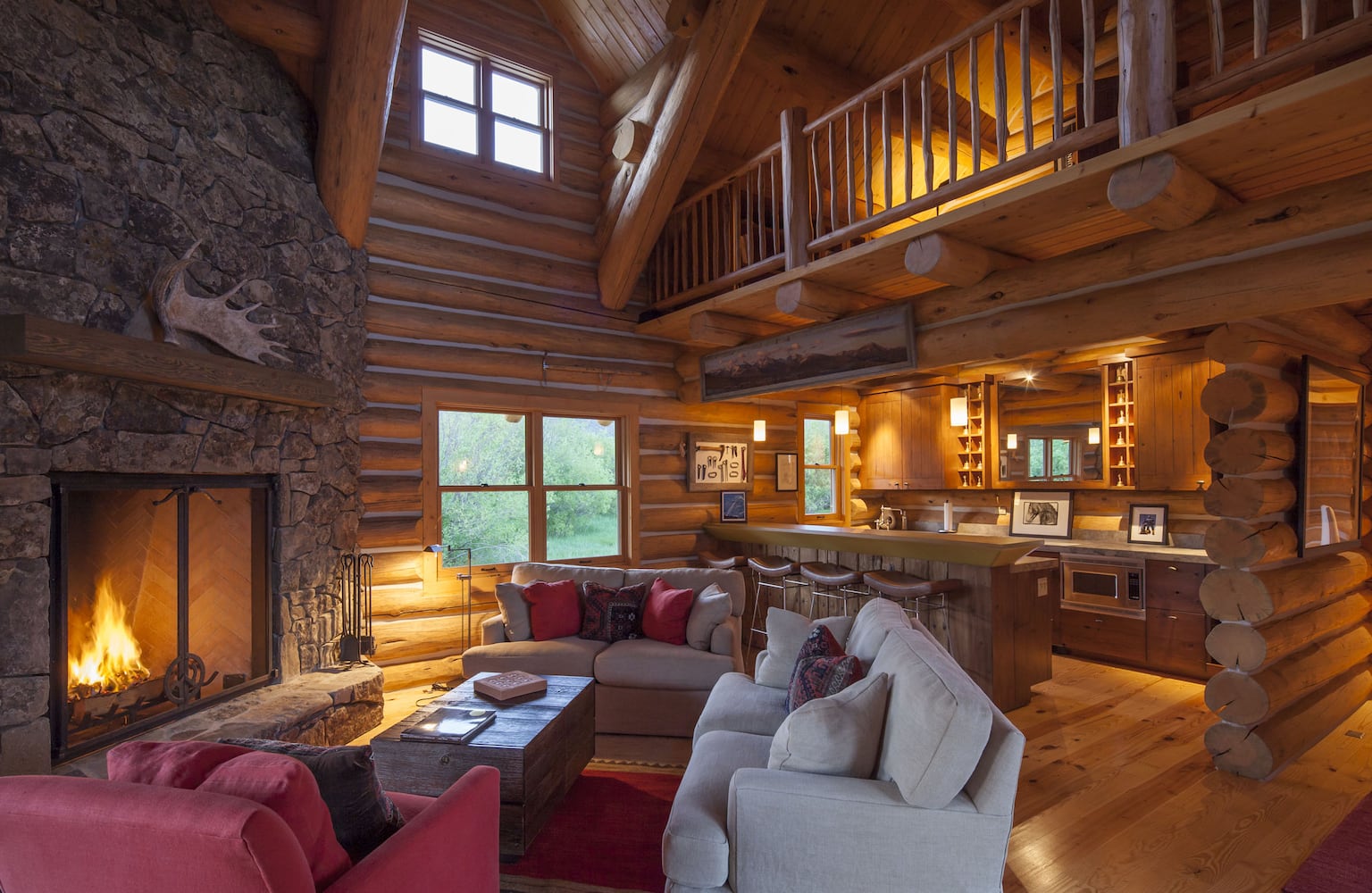 500-acre property has log cabins, mountain views