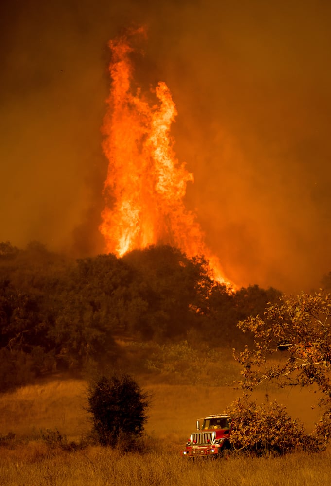 Photos: California wildfires burn thousands of acres, force evacuations