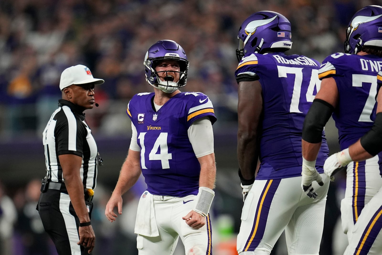 Minnesota Vikings quarterback Sam Darnold (14) celebrates after throwing a touchdown pass during the second half of an NFL football game against the Indianapolis Colts, Sunday, Nov. 3, 2024, in Minneapolis. (AP Photo/Abbie Parr)