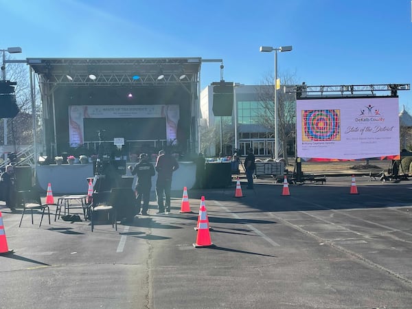 A stage is prepared in a church parking lot for DeKalb County Public Schools Superintendent Cheryl Watson-Harris to deliver her "state of the district" address on Feb. 23, 2020. (WILBORN P. NOBLES III / AJC)