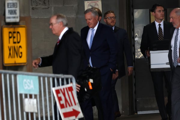 George Terwilliger (far right) is shown leaving the federal courthouse in Atlanta with his client, former White House Chief of Staff Mark Meadows (second from left). Terwilliger has contributed to Republican causes and candidates over the years.
Miguel Martinez /miguel.martinezjimenez@ajc.com