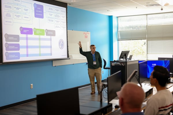 Cybersecurity instructor Andrew Gurbaxani teaches students in the network security class at Gwinnett Technical College, Wednesday, Oct. 18, 2023, in Lawrenceville. Georgia's technical colleges are rebounding after a slump during the COVID-19 pandemic. One of the technical colleges to see the biggest gains this fall compared to a year ago is Gwinnett Technical College. (Jason Getz / Jason.Getz@ajc.com)