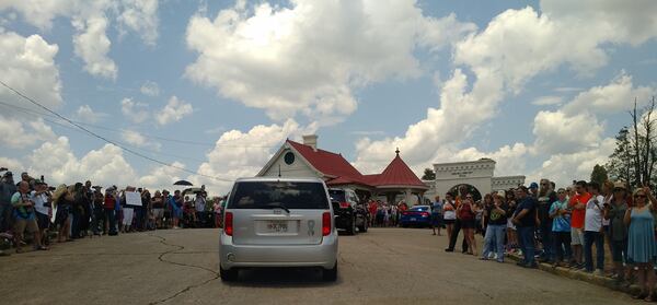  Saturday afternoon, thousands of Allman fans gathered to watch the motorcade and burial at Rose Hill Cemetery in Macon. Photo: Melissa Ruggieri/AJC