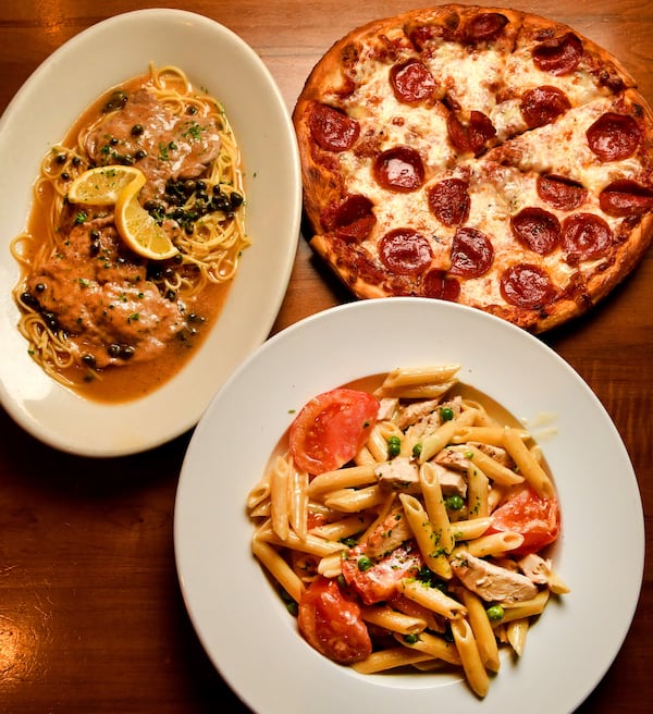 Among the offerings at Pero's Pizza & Pasta are (clockwise from upper left) veal piccata, an individual-size pepperoni pizza and penne Margherita. Chris Hunt for The Atlanta Journal-Constitution