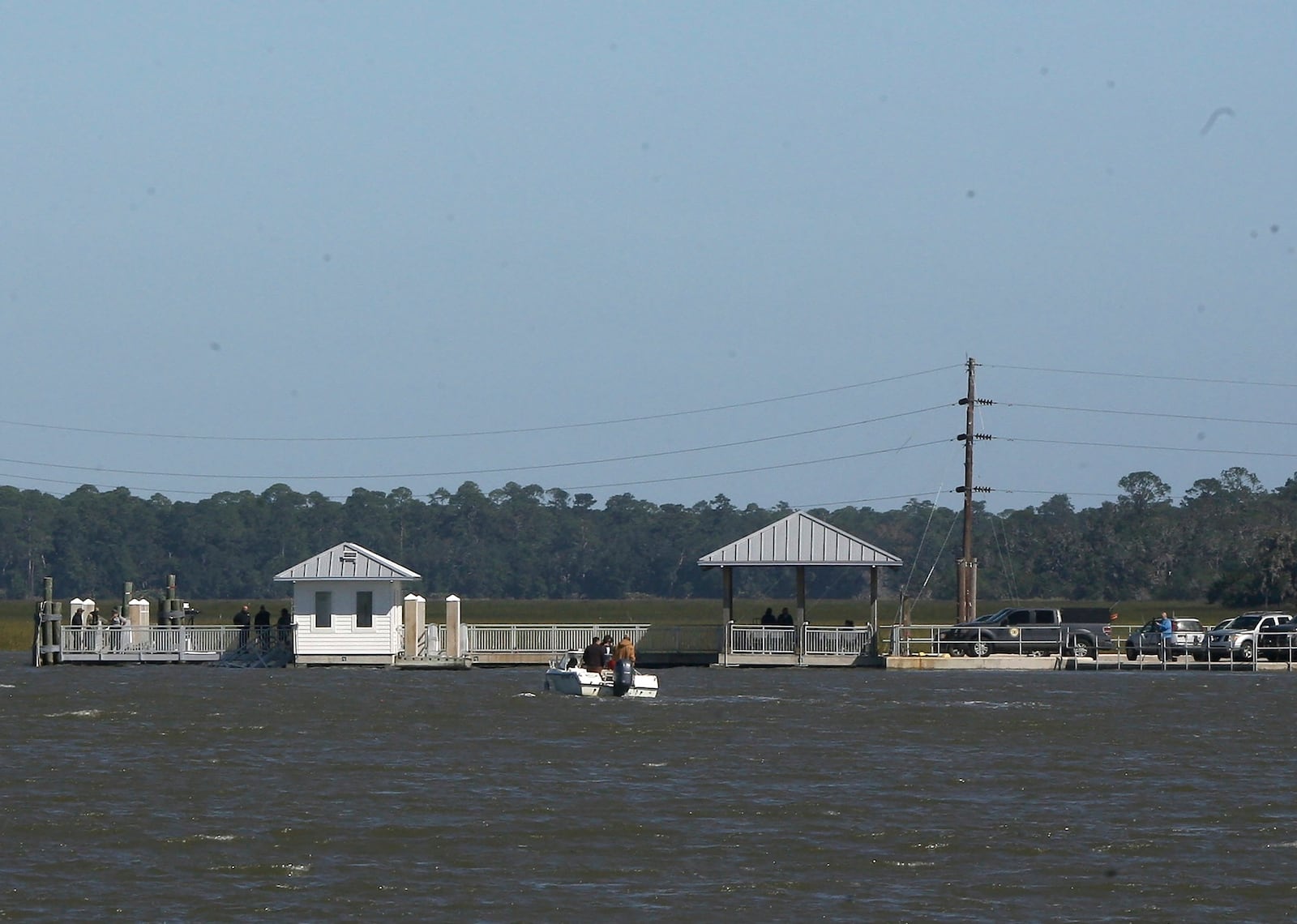 A portion of the gangway which collapsed Saturday afternoon remains visible on Sapelo Island in McIntosh county, Ga., Sunday, Oct. 20, 2024. (AP Photo/Lewis Levine)