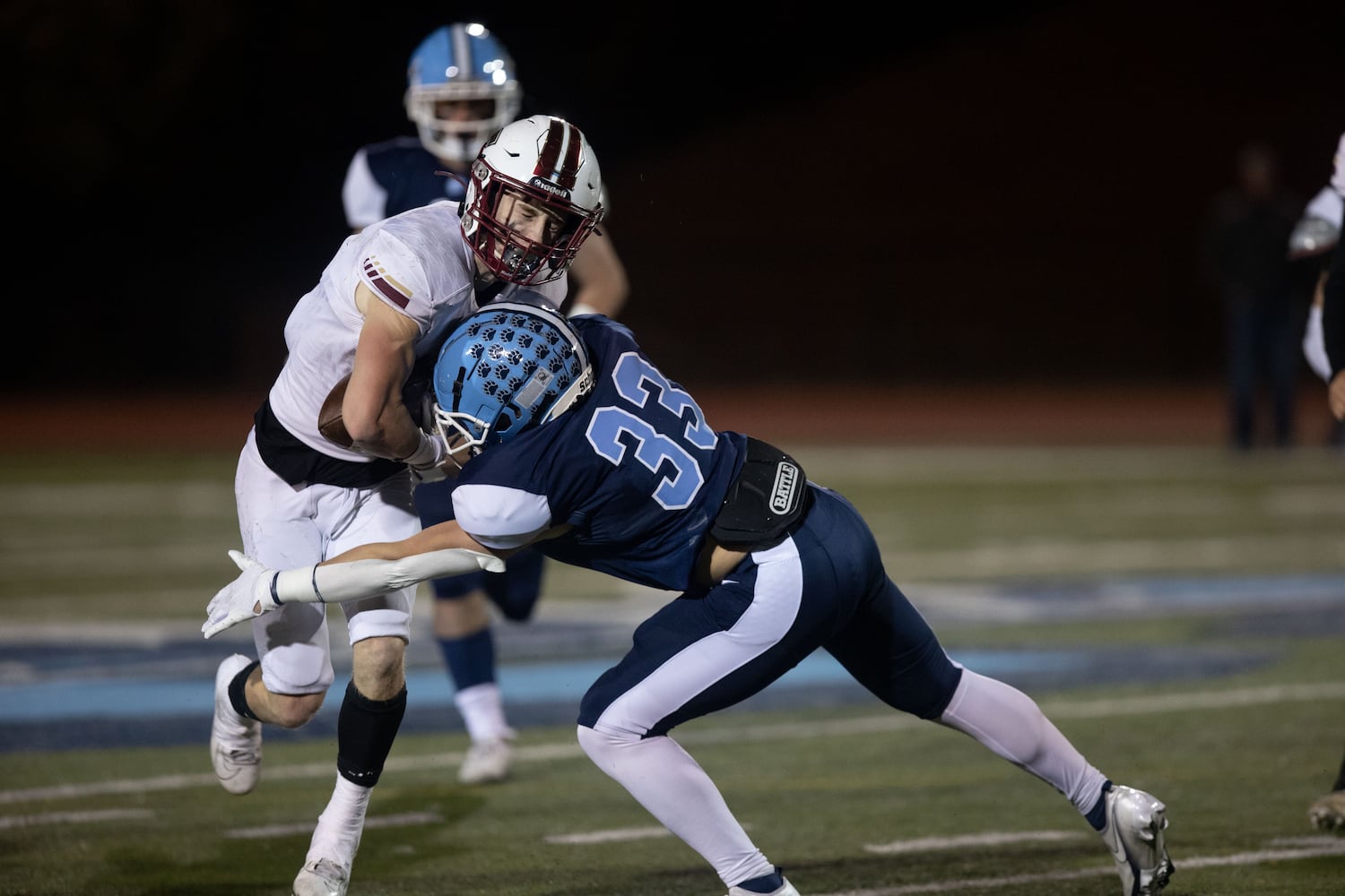 South Paulding's Alex Watkins (7) is tackled by Ben Ridenour (33) during a GHSA high school football game between Cambridge and South Paulding at Cambridge High School in Milton, GA., on Saturday, November 13, 2021. (Photo/Jenn Finch)