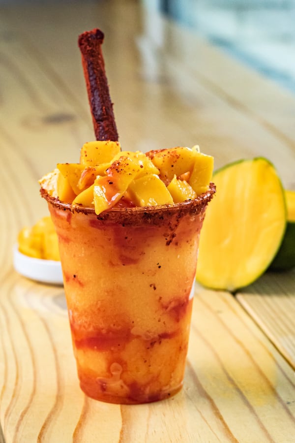 Chi Chi Vegan Taco’s mangonada is a frozen mango drink swirled with a chili-spice mixture. Courtesy of Tolli Marie
