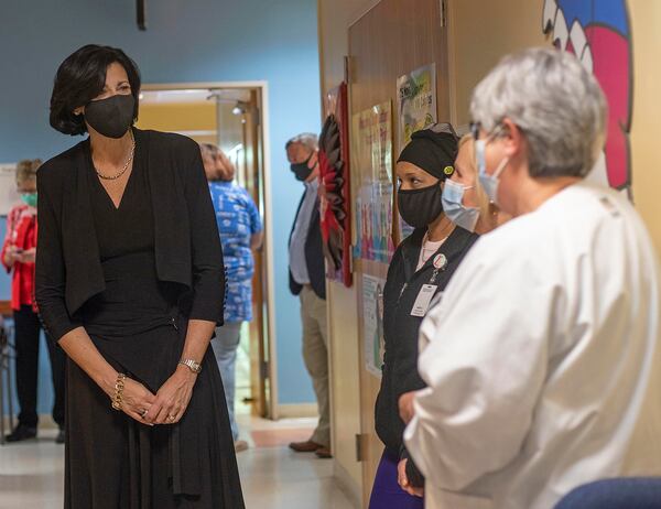 In this file photo from May, Dr. Rochelle Walensky  left, Director of the Centers for Disease Control and Prevention, thanks a group of medical workers at the Whitfield County Health Department in Dalton. (Alyssa Pointer / Alyssa.Pointer@ajc.com)