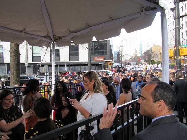 There was a huge logjam on the red carpet. Celebs like Hunter McGrady, a Sports Illustrated swimsuit model who's in town on behalf of Olay, used the time to check their phones. Photo: Jennifer Brett