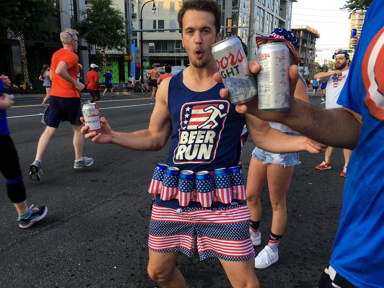 Runners show fashion flair during AJC Peachtree Road Race