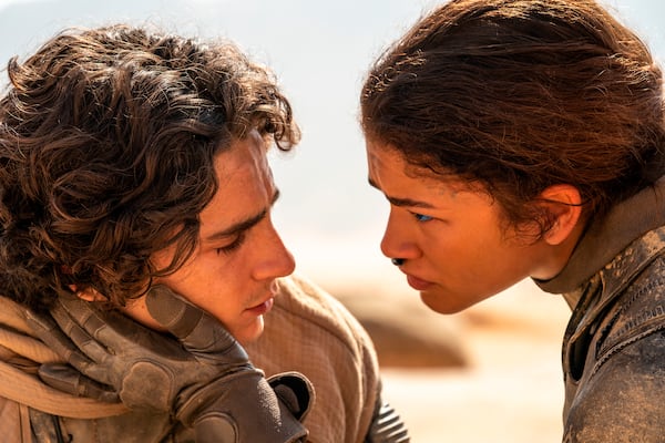 This image released by Warner Bros. Pictures shows Timothee Chalamet, left, and Zendaya in a scene from "Dune: Part Two." (Niko Tavernise/Warner Bros. Pictures via AP)