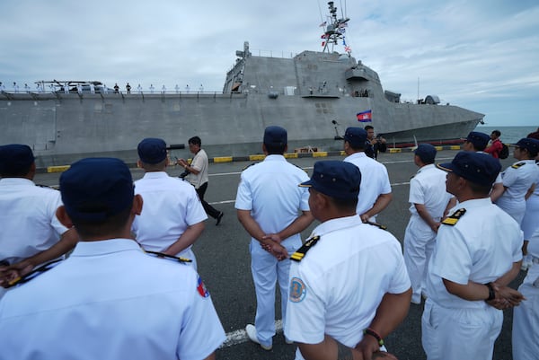 Cambodian naval troop stand for welcoming USS Savannah as it arrives for a port call at Sihanoukville port, Cambodia, Monday, Dec. 16, 2024. (AP Photo/Heng Sinith)