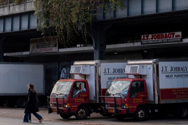 J.T. Jobbagy Inc. trucks stand under the High Line in the Meatpacking District of Manhattan, Tuesday, Nov. 19, 2024, in New York. (AP Photo/Julia Demaree Nikhinson)