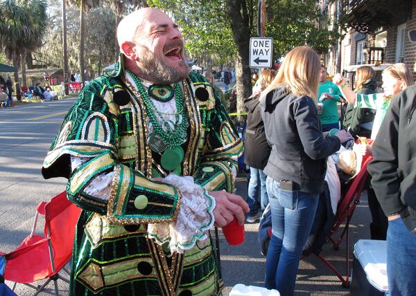 Brian Welzenbach laughs with friends on St. Patrick's Day in 2017 in Savannah. The coastal city has been celebrating the Irish holiday since 1824, and now thousands come each year for one of the South's largest street parties after Mardi Gras. (AP Photo/Russ Bynum)