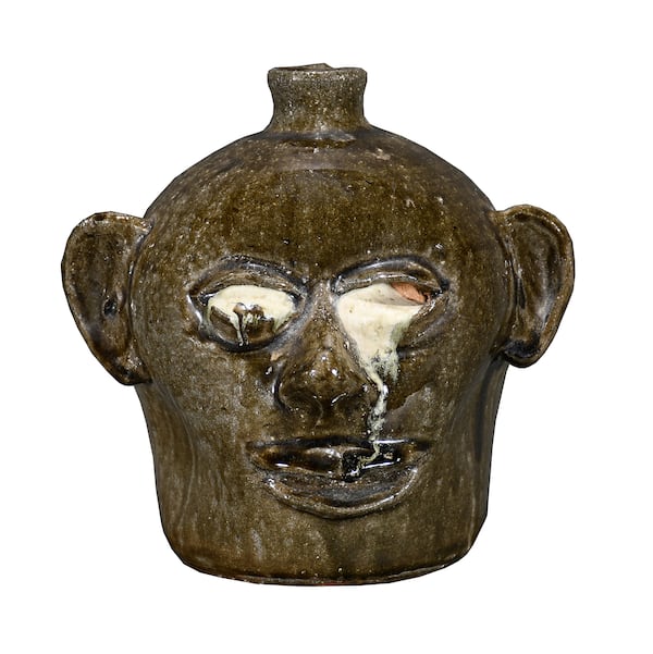 "Runny" eyes on a Lanier Meaders face jug increases its value.
(Courtesy of Slotin Auction)