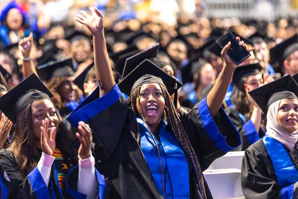 Deborsha Clark cheers at Georgia State University College of Arts and Sciences’ afternoon bachelor’s graduation ceremony in Atlanta on Thursday, May 4, 2023. (Arvin Temkar / arvin.temkar@ajc.com)