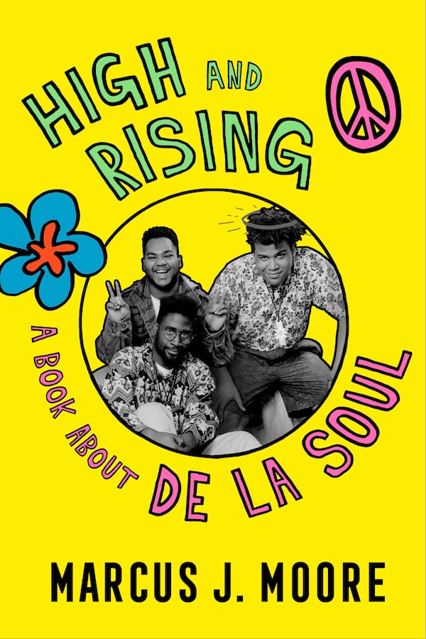 This book cover image released by Dey Street shows "High and Rising: A Book About De La Soul" by Marcus J. Moore. (Dey Street via AP)