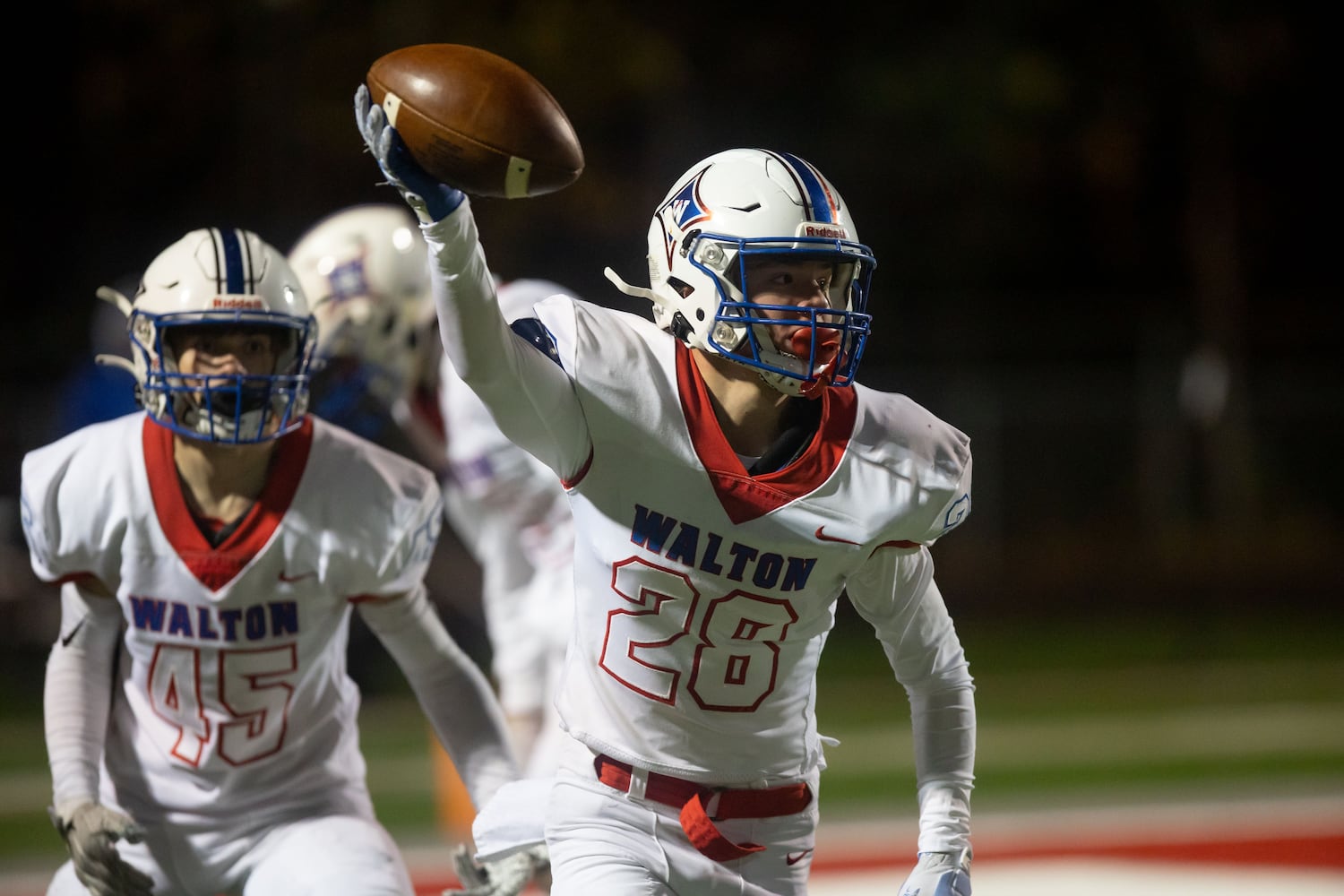 Walton's Davis Callahan (28) celebrates an interception during a GHSA high school football playoff game between the Archer Tigers and the Walton Raiders at Archer High School in Lawrenceville, GA., on Friday, November 19, 2021. (Photo/Jenn Finch)