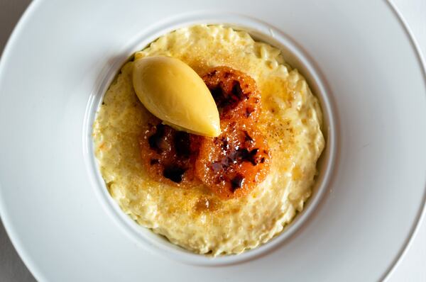 Arborio Rice Pudding with Caramelized Cara Cara Oranges comes from pastry chef Kathryn King at Aria. On top is sorbet made from Cara Cara oranges, matching the caramelized oranges on top. CONTRIBUTED BY HENRI HOLLIS