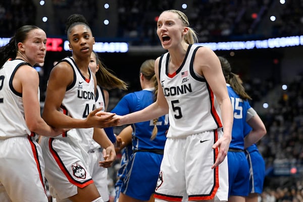 UConn guard Paige Bueckers (5) reacts toward an official in the first half of an NCAA college basketball game against Creighton, Thursday, Feb. 27, 2025, in Hartford, Conn. (AP Photo/Jessica Hill)