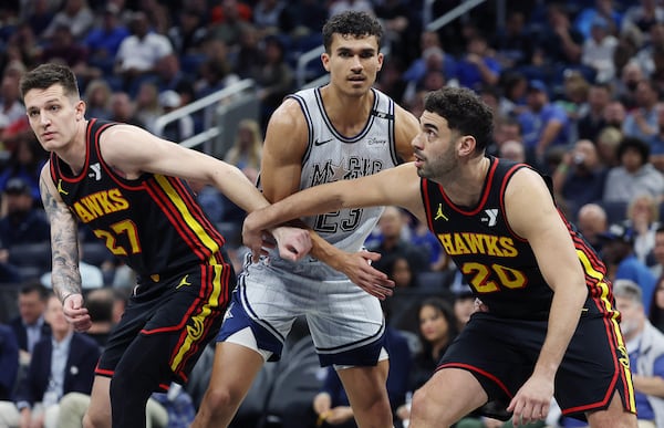 Orlando Magic forward Tristan da Silva (23) battles Atlanta Hawks players Vit Krejci (27) and Georges Niang (20) during the NBA game at the Kia Center on Monday, Feb. 10, 2025, in Orlando, Florida. (Stephen M. Dowell/Orlando Sentinel/TNS)