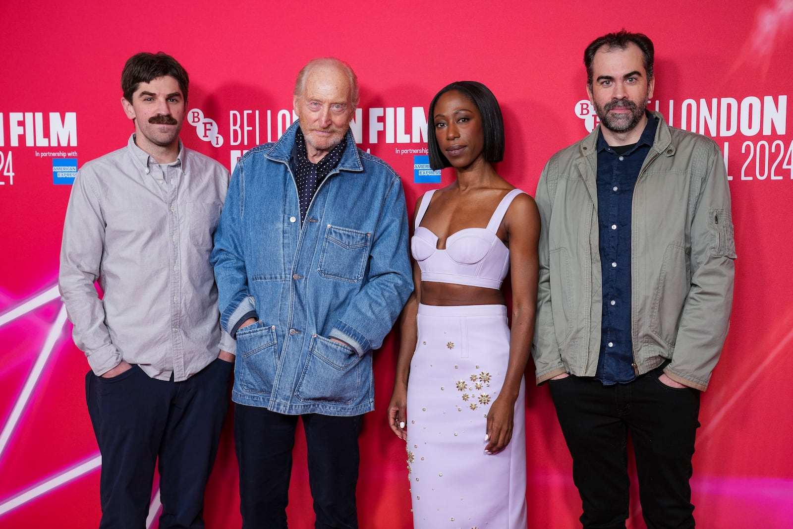 Director Evan Johnson, from left, Charles Dance, Nikki Amuka-Bird and director Galen Johnson pose for photographers upon arrival at the premiere of the film 'Rumours' during the London Film Festival on Sunday, Oct. 13, 2024, in London. (Photo by Scott A Garfitt/Invision/AP)