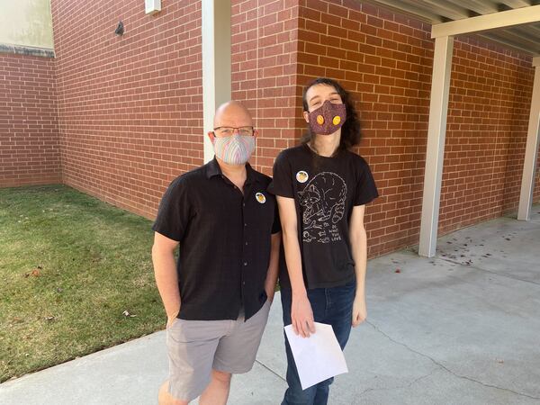 Father and son Steve and Kyra Joiner voted at Vickery Mill Elementary School in Roswell.